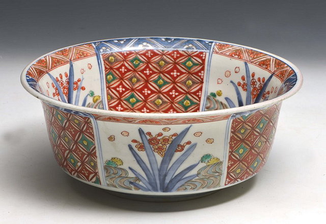 Appraisal: A JAPANESE IMARI HIZEN BOWL with panelled decoration th Century