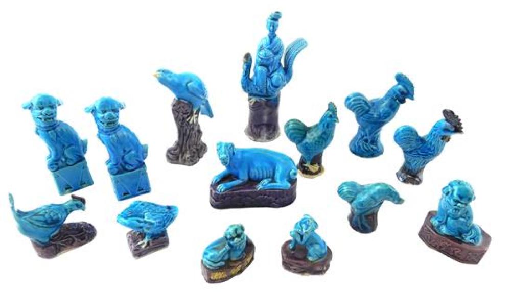 Appraisal: ASIAN Fourteen turquoise and purple glazed ceramic figures Chinese th