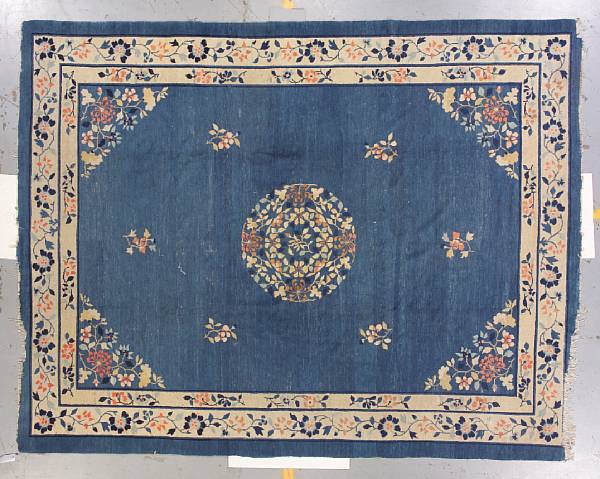 Appraisal: A Chinese carpet size approximately ft x ft in