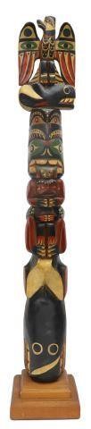 Appraisal: Northwest Coast carved and polychrome painted wood totem pole second