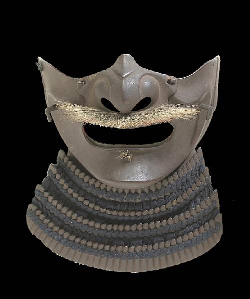 Appraisal: An iron menpo mask Edo Period The plain iron mask