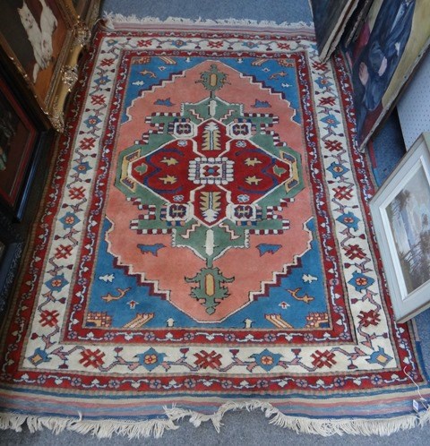 Appraisal: A Turkish rug the pink field with a bold madder