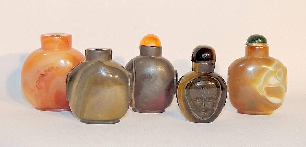 Appraisal: Five Stone Snuff Bottles Five stone snuff bottles Largest tall