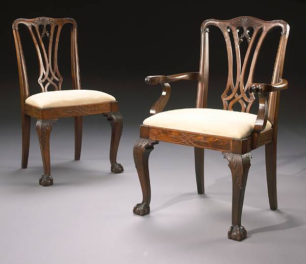 Appraisal: A set of eight George III style carved mahogany dining