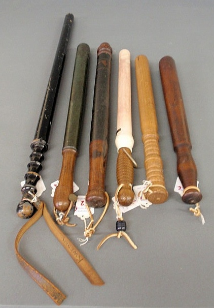 Appraisal: Six police Billy clubs five wood and one porcelain Longest