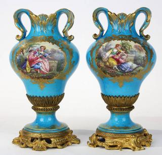 Appraisal: Pair of Continental ormolu mounted urns in the Rococo taste