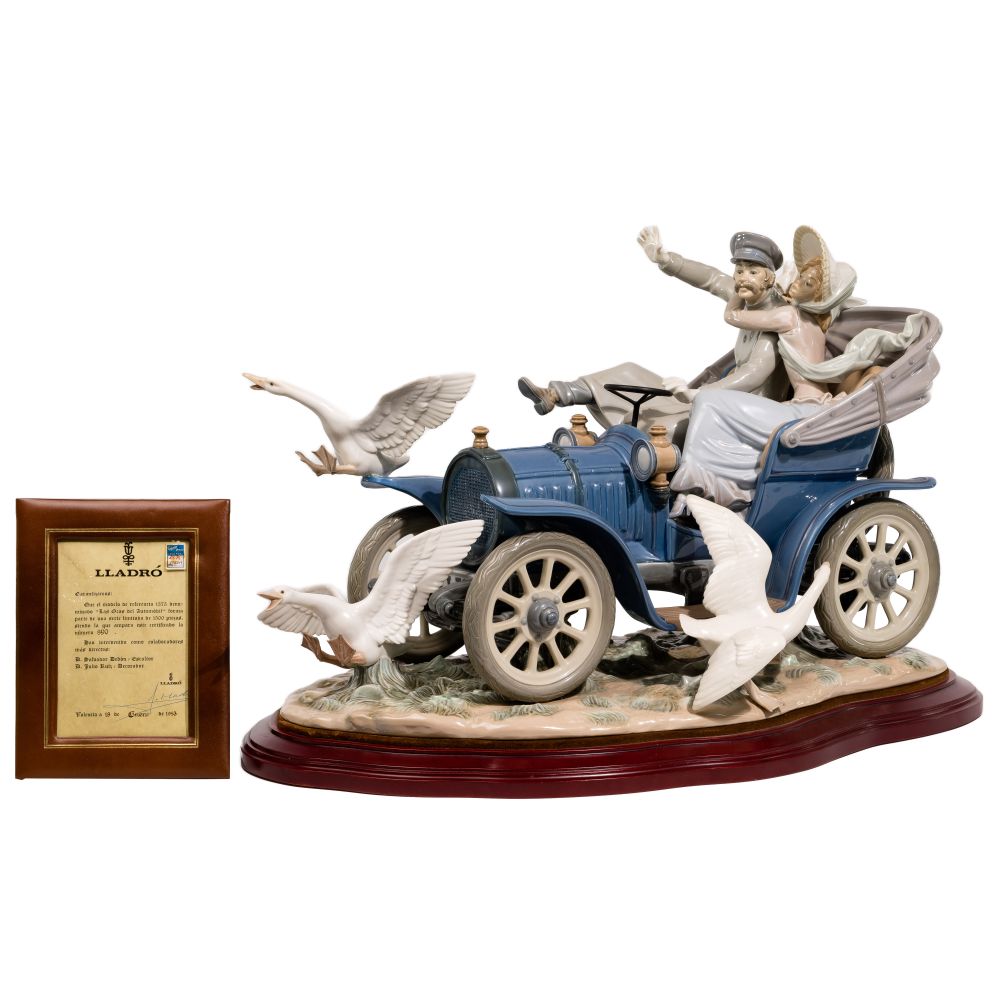 Appraisal: LLADRO CAR IN TROUBLE FIGURINERetired signed by sculptor Salvador Debon