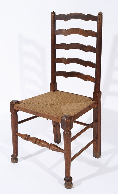 Appraisal: ATTRIBUTED TO HEALS an oak ladderback chair with rush seat