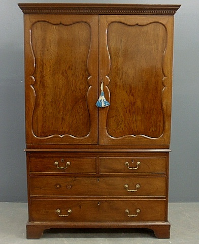 Appraisal: - English Chippendale mahogany two-part linen press c with dentil