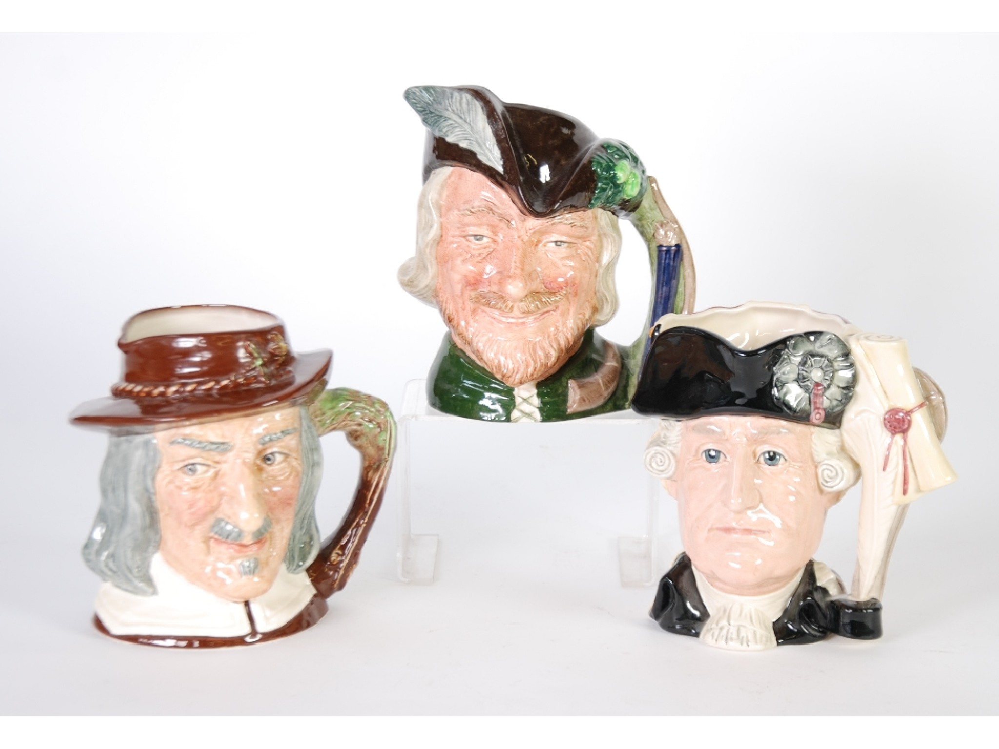 Appraisal: THREE ROYAL DOULTON CHARACTER JUGS 'GEORGE III GEORGE WASHINGTON' THE