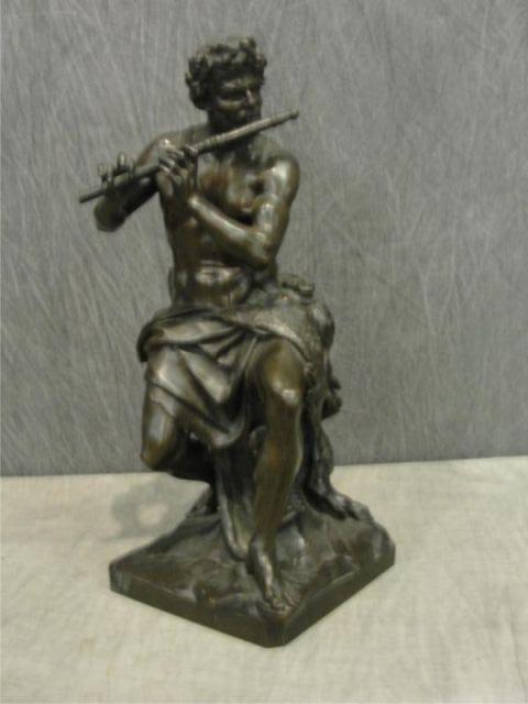 Appraisal: Patinated Bronze Figural Group of Pan and Infant Faun After