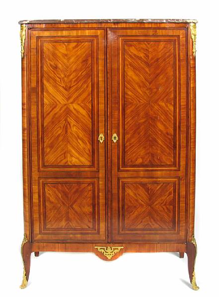 Appraisal: A Louis XV style bronze mounted and marble topped cabinet