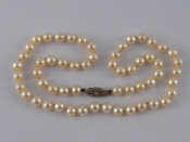 Appraisal: A cultured pearl necklace with diamond set clasp approx cm