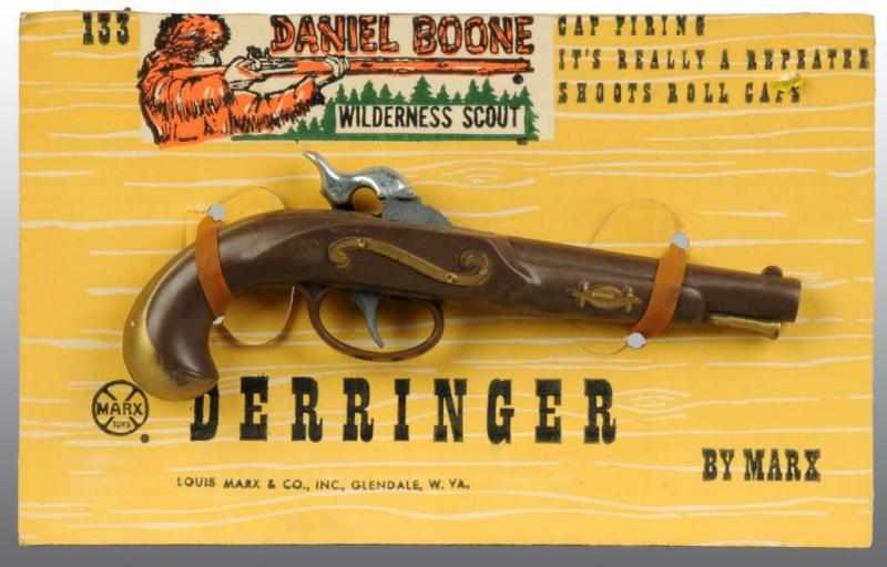 Appraisal: Marx Daniel Boone Toy Darenger Description Still fastened to original