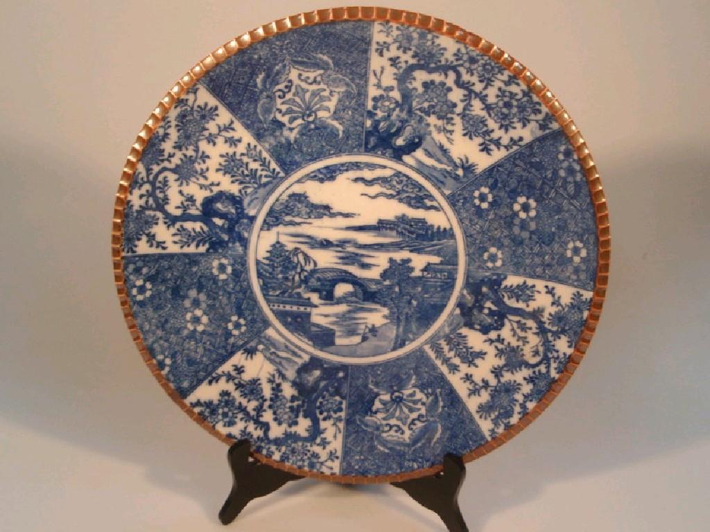 Appraisal: A Chinese blue and white circular plaque decorated in blue