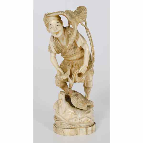 Appraisal: Japanese Ivory Figure of a Cormorant Fisherman Japanese A carved