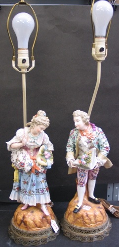 Appraisal: PAIR OF GERMAN PORCELAIN FIGURAL TABLE LAMPS in the manner