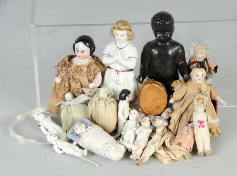 Appraisal: Lot of China Bisque Dolls Description Early china frozen charlotte