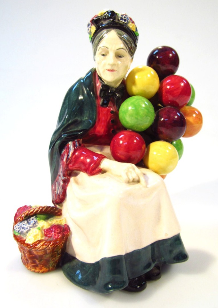 Appraisal: A Royal Doulton figure The Old Balloon Seller HN impressed