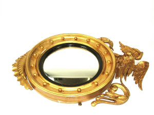 Appraisal: A Regency style giltwood convex wall mirror th century The