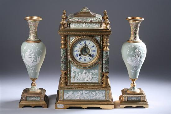 Appraisal: FRENCH BRONZE-DOR AND CHAMPLEV ENAMEL CLOCK GARNITURE works marked Medaille