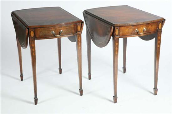 Appraisal: PAIR OF DROP LEAF STANDS Made by Weiman Rounded leather