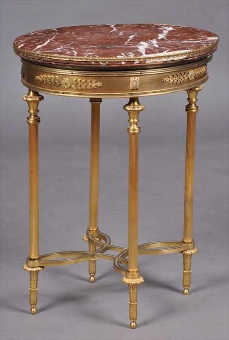 Appraisal: LOUIS XVI-STYLE GILT-METAL MOUNTED OVAL GU RIDON The veined pink