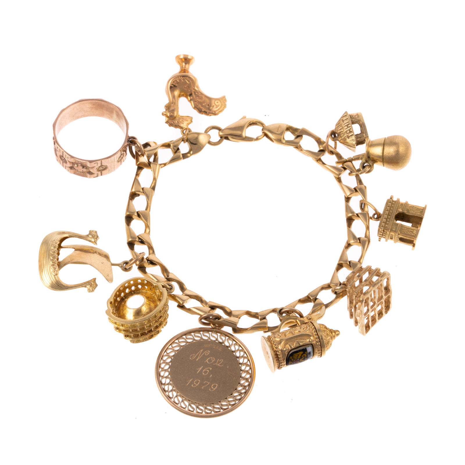 Appraisal: AN K CHARM BRACELET WITH CHARMS K yellow gold curb