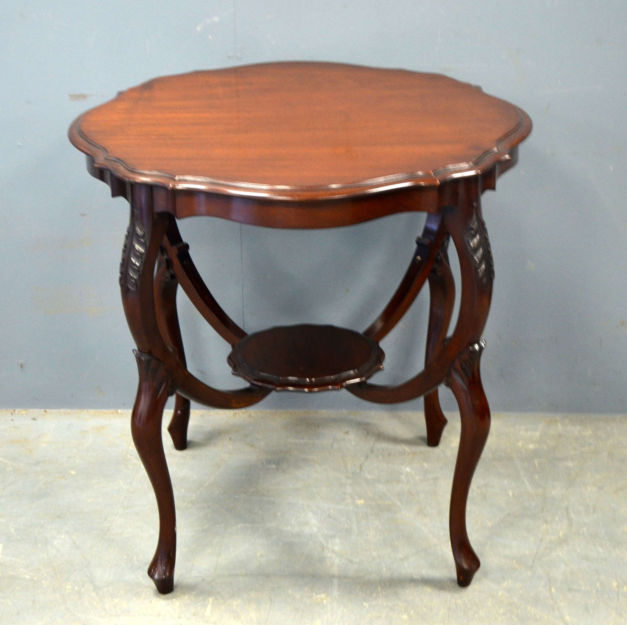 Appraisal: Edwardian mahogany occasional circular table with undertier