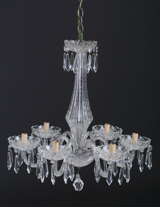 Appraisal: CRYSTAL SIX-LIGHT CHANDELIER th century Tapering standard with six scrolling