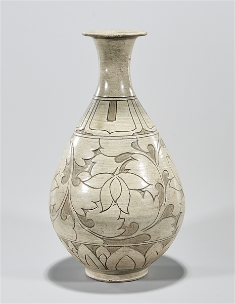 Appraisal: Korean glazed and incised ceramic vase depicting floral designs character