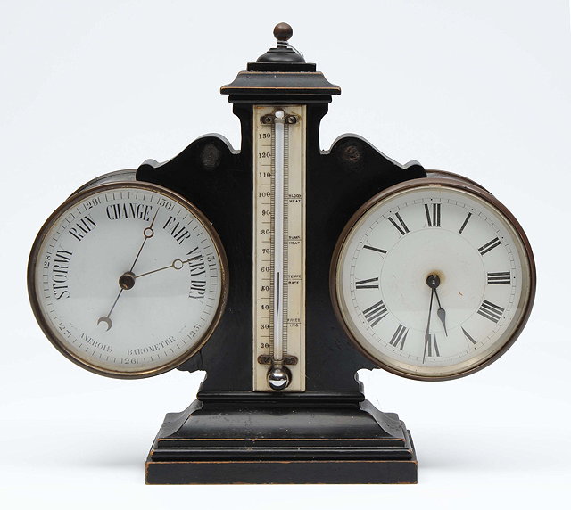 Appraisal: A TH CENTURY DESK TOP BAROMETER thermometer and timepiece on