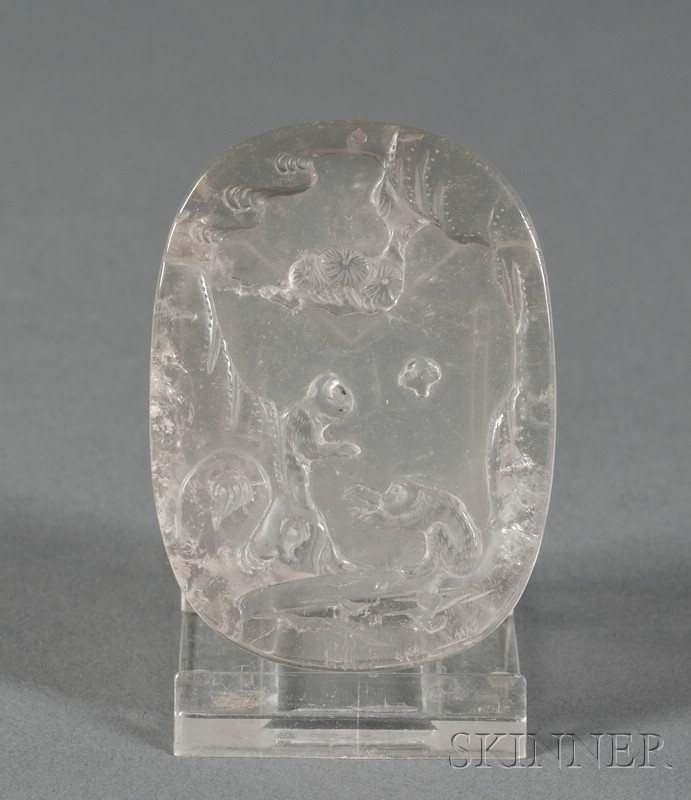 Appraisal: Rock Crystal Pendant rectangular with rounded corners relief carved with