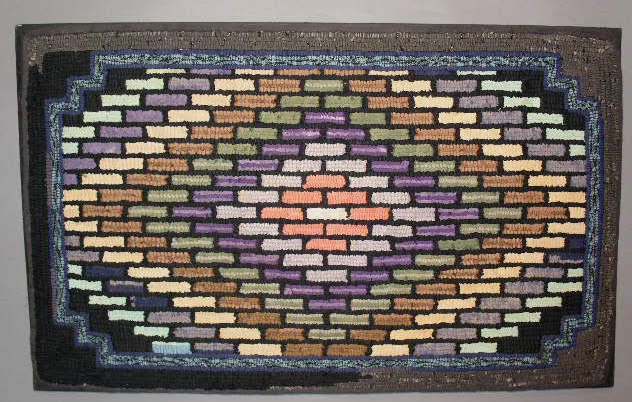 Appraisal: Hooked rug with colorful brick pattern mounted for hanging x