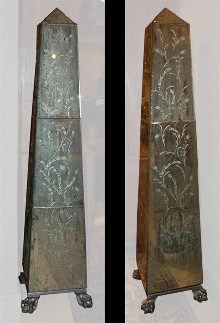 Appraisal: Pair of Mirrored Glass Obelisks Estimate -