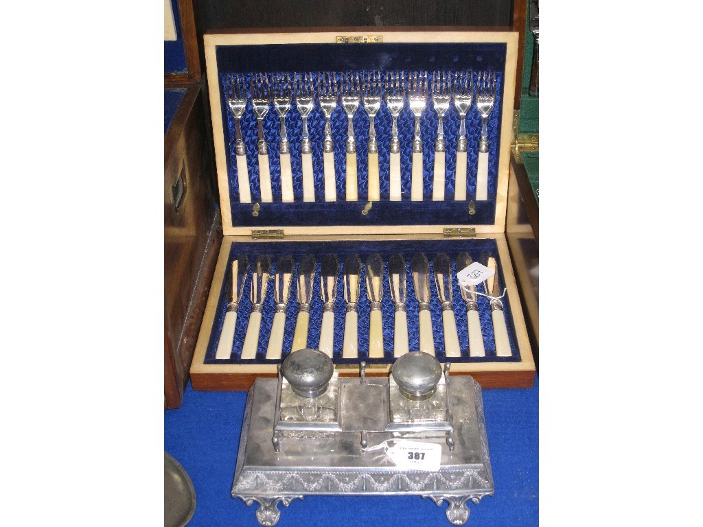 Appraisal: Lot comprising silver plated inkstand and a fish cutlery set