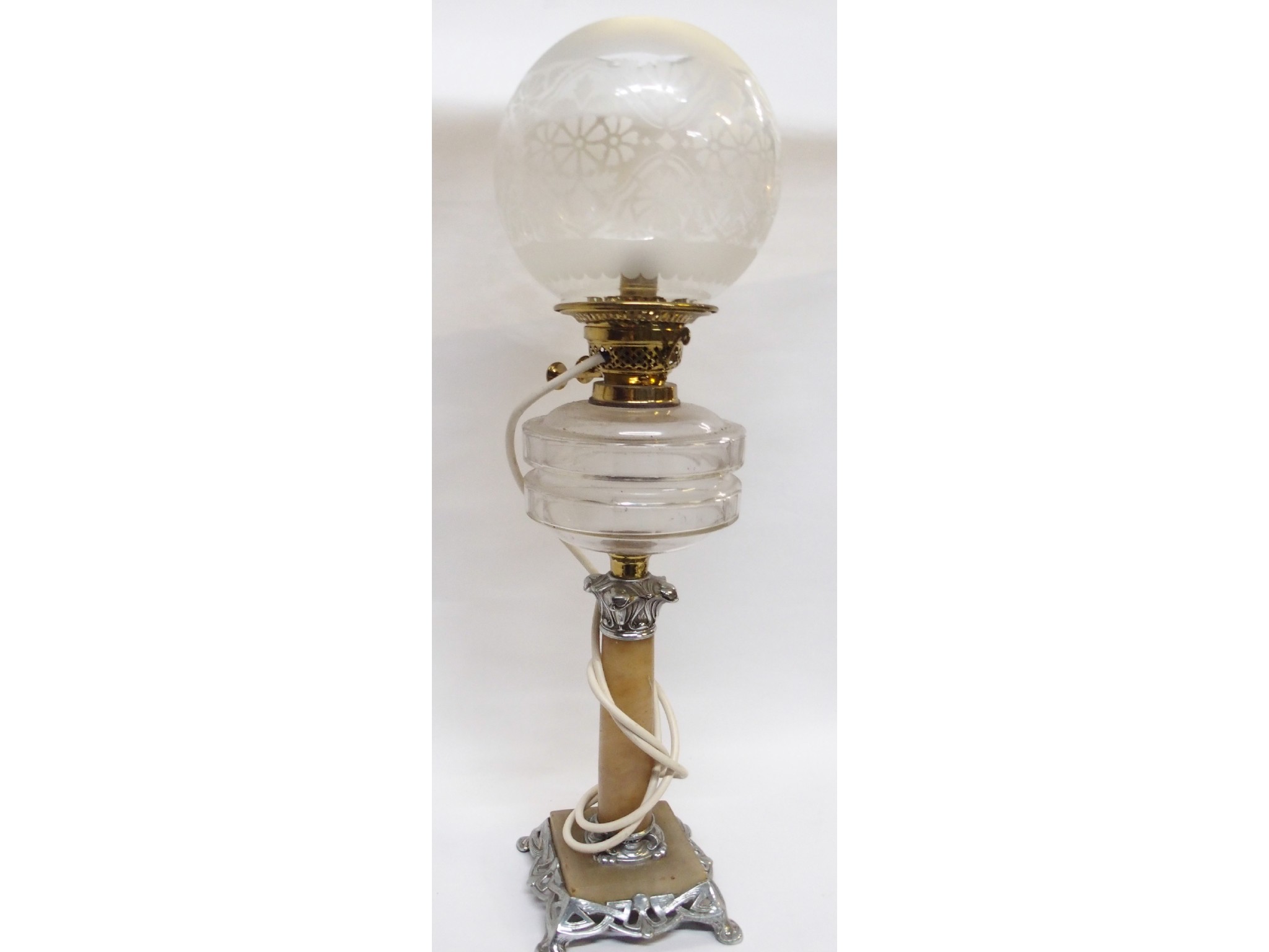 Appraisal: An early th century paraffin lamp the alabaster column mounted