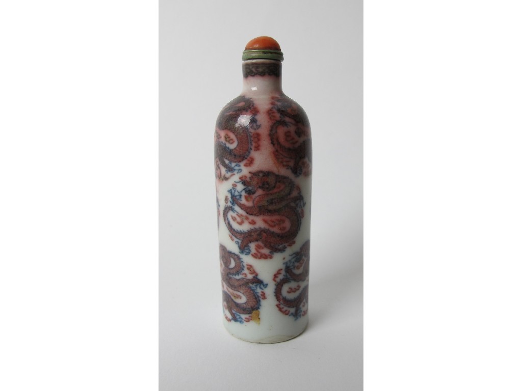 Appraisal: A Chinese porcelain cylindrical snuff bottle decorated with green and