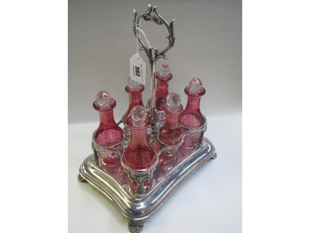 Appraisal: Silver plate and ruby glass six-bottle cruet