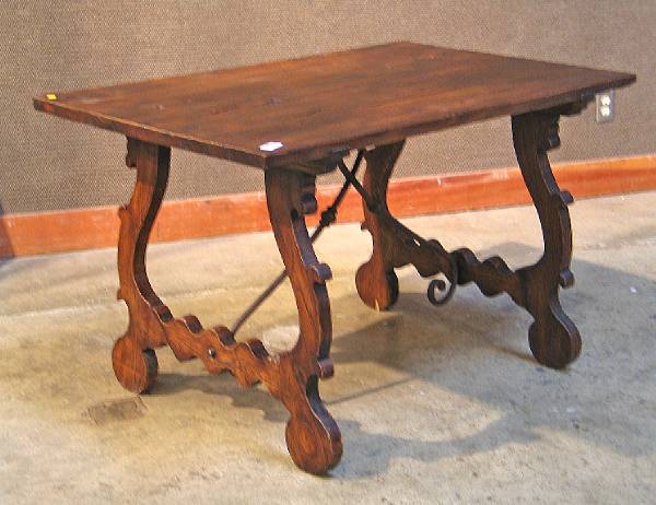 Appraisal: A Spanish Baroque style walnut trestle table