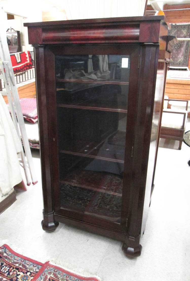 Appraisal: EMPIRE REVIVAL MAHOGANY CABINET BOOKCASE W K Cowan Furniture Co