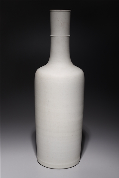 Appraisal: Chinese unglazed porcelain vase the base is glazed with six-character