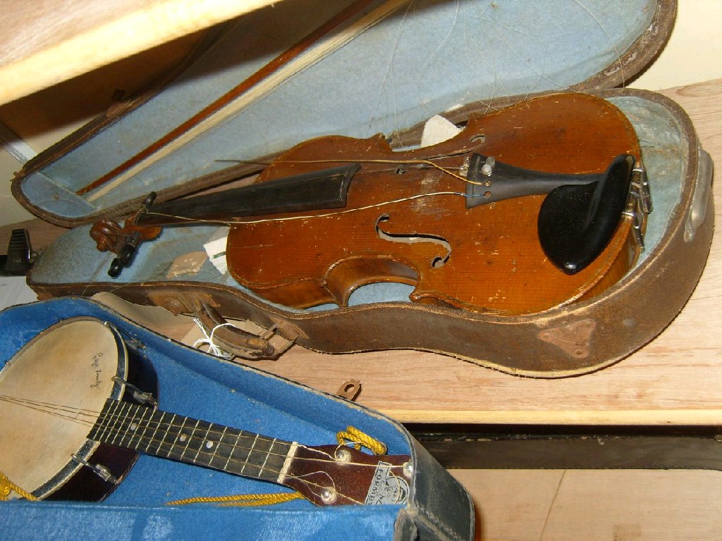 Appraisal: A cased violin with Stradivarius label to interior together with