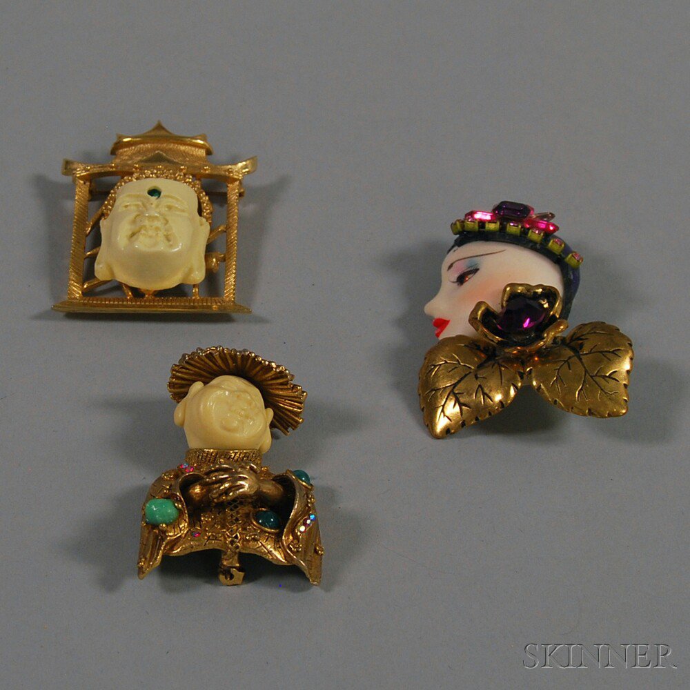 Appraisal: Three Ornate Figural Costume Brooches a HAR brooch of a