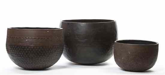 Appraisal: Three Buddhist Singing Bowls each of circular form with hammered