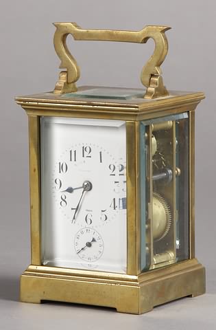 Appraisal: Circa brass and beveled glass case day time strike and