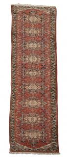 Appraisal: Hand knotted Sino-Heriz wool runner having repeating cream medallions with