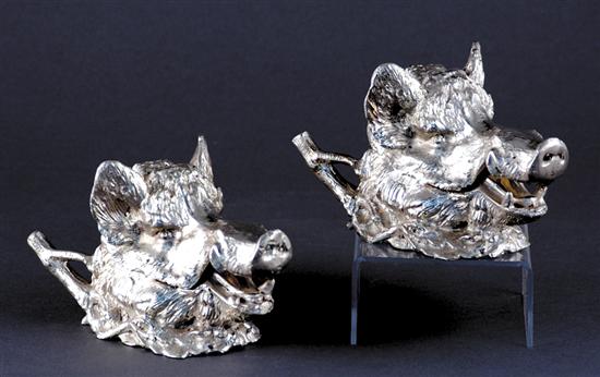 Appraisal: Pair silverplate boar's-head inkwells hinged cover on tree-branch base H