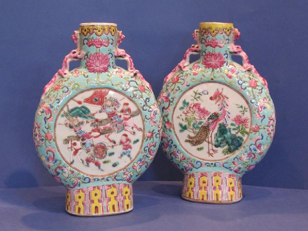 Appraisal: A PAIR OF CHINESE MOON-FLASKS decorated with circular panels of