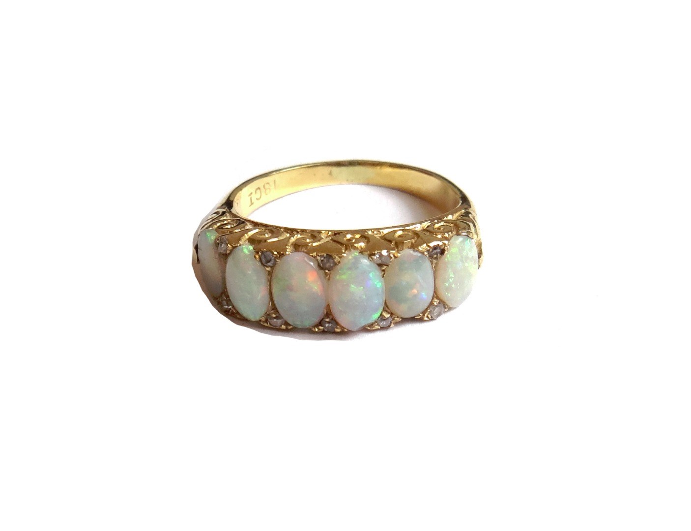 Appraisal: A gold opal and diamond set ring mounted with a